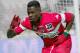 Toulouse's French defender Serge Aurier, gestures after scoring against Marseille, during their League One soccer match, at the Velodrome Stadium, in Marseille, southern France, Sunday, Feb. 2, 2014. (AP Photo/Claude Paris)