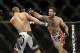 Matt Brown, right, fights Jordan Mein during a UFC welterweight mixed martial arts fight in San Jose, Calif., Saturday, April 20, 2013. Brown won by technical knock out in the second round. (AP Photo/Jeff Chiu)