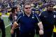 ANN ARBOR, MI - NOVEMBER 30: Head coach Brady Hoke of the Michigan Wolverines walks on the field after losing to the Ohio State Buckeyes 42-41 at Michigan Stadium on November 30, 2013 in Ann Arbor, Michigan. (Photo by Gregory Shamus/Getty Images)