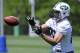 New York Jets tight end Jace Amaro catches a pass during NFL football rookie camp Saturday, May 17, 2014, in Florham Park, N.J. Amaro was a second-round pick from Texas Tech. (AP Photo/Bill Kostroun)