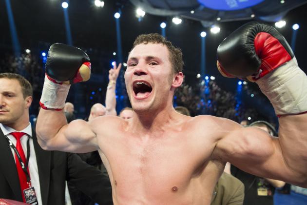 German Robert Stieglitz celebrates after winning the WBO super middleweight world champion bout against defending champion Arthur Abraham with technical knockout in Magdeburg, Germany, Sunday, March 24, 2013. (AP Photo/Gero Breloer)