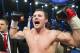 German Robert Stieglitz celebrates after winning the WBO super middleweight world champion bout against defending champion Arthur Abraham with technical knockout in Magdeburg, Germany, Sunday, March 24, 2013. (AP Photo/Gero Breloer)
