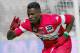 Toulouse's French defender Serge Aurier, gestures after scoring against Marseille, during their League One soccer match, at the Velodrome Stadium, in Marseille, southern France, Sunday, Feb. 2, 2014. (AP Photo/Claude Paris)