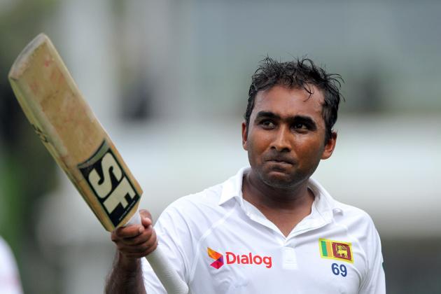Sri Lankan cricketer Mahela Jayawardene celebrates his century during the first day of the second test cricket match between Sri Lanka and South Africa in Colombo, Sri Lanka, Thursday, July 24, 2014. (AP Photo/Sanka Gayashan)