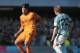 Real Madrid's Sami Khedira, left, in action with Celta's Michael Krohn-Dehlli during a Spanish La Liga soccer match at the Balaidos stadium in Vigo, Spain, Sunday, May 11, 2014. (AP Photo/Lalo R. Villar)
