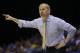 Michigan head coach John Beilein gestures during the first half of an NCAA Midwest Regional final college basketball tournament game against Kentucky Sunday, March 30, 2014, in Indianapolis. (AP Photo/Michael Conroy)