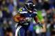 SEATTLE, WA - DECEMBER 02: Running back Marshawn Lynch #24 of the Seattle Seahawks carries the ball against the New Orleans Saints during a game at CenturyLink Field on December 2, 2013 in Seattle, Washington. (Photo by Jonathan Ferrey/Getty Images)