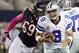 Chicago Bears defensive tackle Henry Melton (69) moves in to sack Dallas Cowboys quarterback Tony Romo (9) during the first half of an NFL football game, Monday, Oct. 1, 2012, in Arlington, Texas. (AP Photo/Tony Gutierrez)