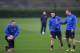 ST ALBANS, ENGLAND - FEBRUARY 18: Per Mertesacker, Mesut Ozil and Lukas Podolski of Arsenal warm up during a training session at London Colney on February 18, 2014 in St Albans, England. (Photo by Shaun Botterill/Getty Images)