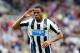 Newcastle United's Loic Remy celebrates his goal during their English Premier League soccer match against Cardiff City at St James' Park, Newcastle, England, Saturday, May 3, 2014. (AP Photo/Scott Heppell)