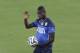 Italy's Mario Balotelli waves prior to a training session of Italy in Natal, Brazil, Saturday, June 21, 2014. Italy plays in group D of the 2014 soccer World Cup. Italy proved ineffective in a 1-0 loss to Costa Rica on Friday and now the Azzurri need a win or a draw against Uruguay on Tuesday to reach the second round. (AP Photo/Antonio Calanni)