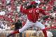 Cincinnati Reds starting pitcher Johnny Cueto throws against the Pittsburgh Pirates in the fourth inning of a baseball game, Sunday, July 13, 2014, in Cincinnati. (AP Photo/David Kohl)