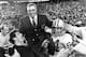 Green Bay Packers coach Vince Lombardi is carried off the field after his team defeated the Oakland Raiders 33 to 14 in the Super Bowl II game in Miami, Fla. on Jan. 14, 1968. Packers guard Jerry Kramer (64) is at right. (AP Photo)