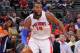 AUBURN HILLS, MI - JANUARY 11: Greg Monroe #10 of the Detroit Pistons handles the ball against the Phoenix Suns on January 11, 2014 at The Palace of Auburn Hills in Auburn Hills, Michigan. NOTE TO USER: User expressly acknowledges and agrees that, by downloading and/or using this photograph, User is consenting to the terms and conditions of the Getty Images License Agreement. Mandatory Copyright Notice: Copyright 2014 NBAE (Photo by D. Williams/Einstein/NBAE via Getty Images)