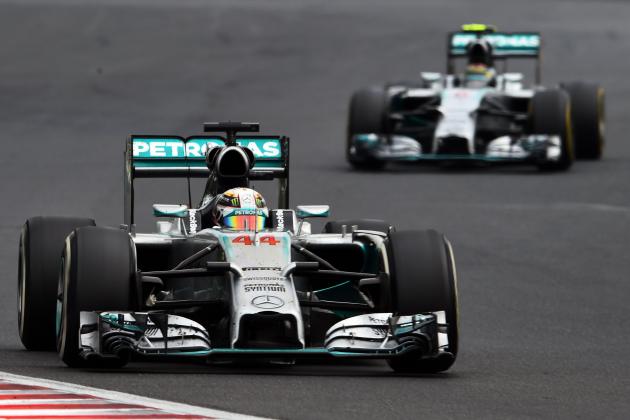 BUDAPEST, HUNGARY - JULY 27: Lewis Hamilton of Great Britain and Mercedes GP leads Nico Rosberg of Germany and Mercedes GP during the Hungarian Formula One Grand Prix at Hungaroring on July 27, 2014 in Budapest, Hungary. (Photo by Lars Baron/Getty Images)