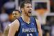 Minnesota Timberwolves forward Kevin Love (42) yells after hitting a three pointer against the Phoenix Suns during the second half of an NBA basketball game, Tuesday, Feb. 25, 2014, in Phoenix. (AP Photo/Matt York)