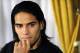 Colombian soccer star Radamel Falcao reacts as he attends a press conference at the Trindade Hospital in Porto, Portugal, Monday, Jan. 27, 2014. Colombia and Monaco's striker Falcao is in a race against time to get fit for the World Cup in June after undergoing knee surgery Saturday, Jan. 25, with his doctor giving him a better than 50-50 chance of making it. (AP Photo/Paulo Duarte)