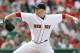 Boston Red Sox's Jon Lester pitches during the eighth inning of a baseball game against the Kansas City Royals in Boston, Sunday, July 20, 2014. (AP Photo/Michael Dwyer)