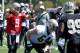 New Orleans Saints quarterback Drew Brees (9) directs the offensive line on a play during an NFL football training camp in White Sulphur Springs, W. Va., Saturday, July 26, 2014. (AP Photo/Chris Tilley)