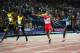GLASGOW, SCOTLAND - JULY 28: Kemar Bailey-Cole of Jamaica (2R) crosses the line to win gold ahead of silver medalist Adam Gemili of England (R) in the Mens 100 metres final at Hampden Park during day five of the Glasgow 2014 Commonwealth Games on July 28, 2014 in Glasgow, United Kingdom. (Photo by Ian Walton/Getty Images)