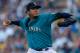 SEATTLE, WA - JULY 25: Starting pitcher Felix Hernandez #34 of the Seattle Mariners pitches in the first inning against the Baltimore Orioles at Safeco Field on July 25, 2014 in Seattle, Washington. (Photo by Otto Greule Jr/Getty Images)