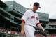 Boston Red Sox starting pitcher Jon Lester heads to the bull pen before a baseball game against the Kansas City Royals in Boston, Sunday, July 20, 2014. (AP Photo/Michael Dwyer)