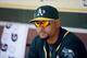OAKLAND, CA - APRIL 19: Coco Crisp #4 of the Oakland Athletics sits in the dugout before their game against the Houston Astros at O.co Coliseum on April 19, 2014 in Oakland, California. (Photo by Ezra Shaw/Getty Images)
