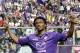 Fiorentina's Juan Cuadrado celebrates after scoring during a Serie A soccer match between Fiorentina and Udinese at the Artemio Franchi stadium in Florence, Italy, Sunday, April 6 2014. (AP Photo/Fabrizio Giovannozzi)