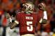 PASADENA, CA - JANUARY 06: Quarterback Jameis Winston #5 of the Florida State Seminoles looks to pass against the Auburn Tigers in the third quarter of the 2014 Vizio BCS National Championship Game at the Rose Bowl on January 6, 2014 in Pasadena, California. (Photo by Stephen Dunn/Getty Images)
