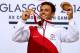EDINBURGH, SCOTLAND - AUGUST 02: Tom Daley of England celebrates on the podium after winning the Gold medal in the Men's 10m Platform Final at the Royal Commonwealth Pool during day ten of the Glasgow 2014 Commonwealth Games on August 2, 2014 in Edinburgh, United Kingdom. (Photo by Clive Rose/Getty Images)