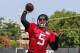 Jacksonville Jaguars quarterback Blake Bortles (5) warms up at NFL football practice, first day with pads on Wednesday, July 30, 2014 in Jacksonville, Fla. (AP Photo/Gary McCullough)