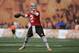 Cleveland Browns quarterback Johnny Manziel passes during an NFL football training camp in Berea, Ohio Sunday, July 27, 2014. (AP Photo/Mark Duncan)