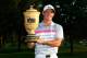 AKRON, OH - AUGUST 03: Rory McIlroy of Northern Ireland holds the Gary Player Cup trophy after winning the World Golf Championships-Bridgestone Invitational with a score of -15 during the final round at Firestone Country Club South Course on August 3, 2014 in Akron, Ohio. (Photo by Sam Greenwood/Getty Images)
