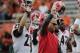 Georgia head coach Mark Richt, center, and his players hold their helmets high prior to the start of an NCAA college football game against Auburn in Auburn, Ala., Saturday, Nov. 16, 2013. (AP Photo/Dave Martin)