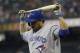 Toronto Blue Jays' Dioner Navarro holds the bat over his head after striking out against the Houston Astros during the third inning of a baseball game Friday, Aug. 1, 2014, in Houston. (AP Photo/David J. Phillip)