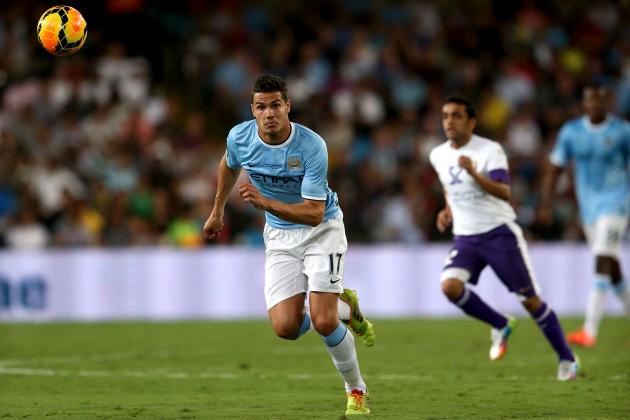AL AIN, UNITED ARAB EMIRATES - MAY 15:  Jack Rodwell of Manchester City in action during the friendly match between Al Ain and Manchester City at Hazza bin Zayed Stadium on May 15, 2014 in Al Ain, United Arab Emirates.  (Photo by Warren Little/Getty Images)