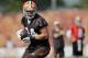 Cleveland Browns tight end Jordan Cameron catches a pass during an NFL football training camp in Berea, Ohio Sunday, July 27, 2014. (AP Photo/Mark Duncan)