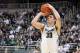 Feb 16, 2014; East Lansing, MI, USA; Michigan State Spartans forward Kenny Kaminski (30) attempts a three point basket against the Nebraska Cornhuskers during the 2nd half of a game at Jack Breslin Student Events Center. Nebraska won 60-51. Mandatory Credit: Mike Carter-USA TODAY Sports