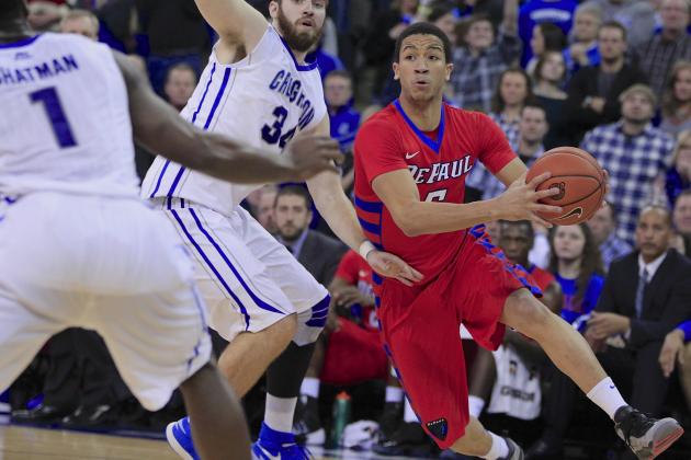 DePaul's Billy Garrett Jr. (5) drives around Creighton's Ethan Wragge (34) and Austin Chatman (1) in the second half of an NCAA college basketball game in Omaha, Neb., Friday, Feb. 7, 2014. Creighton won 78-66. (AP Photo/Nati Harnik)