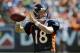 Denver Broncos quarterback Peyton Manning warms up before the start of the NFL Broncos Summer Scrimmage at Sports Authority Field at Mile High on Saturday, Aug. 2, 2014, in Denver. (AP Photo/Chris Schneider)