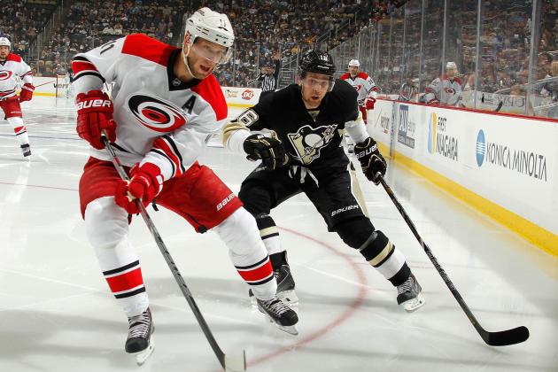 PITTSBURGH, PA - APRIL 1:  Jordan Staal #11 of the Carolina Hurricanes skates alongside Brandon Sutter #16 of the Pittsburgh Penguins on April 1, 2014 at Consol Energy Center in Pittsburgh, Pennsylvania.  (Photo by Gregory Shamus/NHLI via Getty Images)