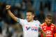 Marseille's French midfielder Florian Thauvin celebrates after defeating Lyon during their League One soccer match at the Velodrome Stadium, in Marseille, southern France, Sunday, May 4, 2014. (AP Photo/Claude Paris)