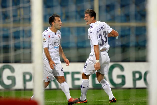 Fiorentina's Giuseppe Rossi celebrates with his German teammate Mario Gomez, right, after scoring, during a Serie A soccer match between Genoa and Fiorentina, at Genoa's Luigi Ferraris Stadium, Italy, Sunday, Sept 1, 2013. (AP Photo/Tano Pecoraro)