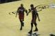 Jun 5, 2014; San Antonio, TX, USA; Miami Heat guard Dwyane Wade (3) talks with forward Chris Bosh (1) after a timeout in the second half against the San Antonio Spurs in game one of the 2014 NBA Finals at AT&T Center. Mandatory Credit: Brendan Maloney-USA TODAY Sports