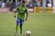 Seattle Sounders' DeAndre Yedlin looks to pass during an MLS soccer match against the Los Angeles Galaxy, Monday, July 28, 2014, in Seattle. (AP Photo/Ted S. Warren)