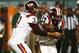 Nov 9, 2013; Miami Gardens, FL, USA; Virginia Tech Hokies quarterback Logan Thomas (3) fakes a handoff to running back Trey Edmunds (14) in the first quarter of a game against the Miami Hurricanes at Sun Life Stadium. Mandatory Credit: Robert Mayer-USA TODAY Sports
