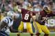Aug 7, 2014; Landover, MD, USA; Washington Redskins quarterback Kirk Cousins (8) throws the ball against the New England Patriots in the first quarter at FedEx Field. Mandatory Credit: Rafael Suanes-USA TODAY Sports