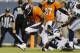 Denver Broncos wide receiver Jordan Norwood (11) scores a touchdown as Seattle Seahawks' Terrell Thomas (21) defends during the second half of an NFL preseason football game, Thursday, Aug. 7, 2014, in Denver. (AP Photo/Joe Mahoney)