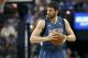 FILE - In this April 13, 2014, file photo, Minnesota Timberwolves forward Kevin Love gets ready to play the Sacramento Kings in Sacramento, Calif. A person with knowledge of the situation tells The Associated Press that the Timberwolves and Golden State Warriors have restarted trade talks for All-Star forward Kevin Love. (AP Photo/Steve Yeater, File)