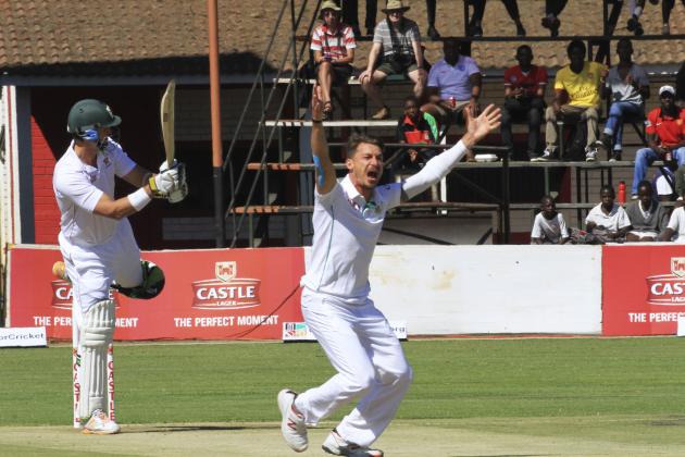 South African bowler Dale Steyn, right, appeals unsuccessfully for the wicket of Zimbabwean Batsman Mark Vermeulen during the match at Harare Sports club in Harare, Saturday, Aug. 9, 2014. Zimbabwe won the toss and elected to bat on the first day of the one off test against South Africa. (AP Photo/Tsvangirayi Mukwazhi)